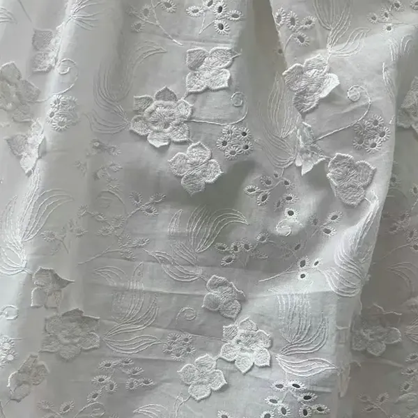 Tela de encaje de bordado 100% de algodón decorado con flores 3D con agujeros de ojales